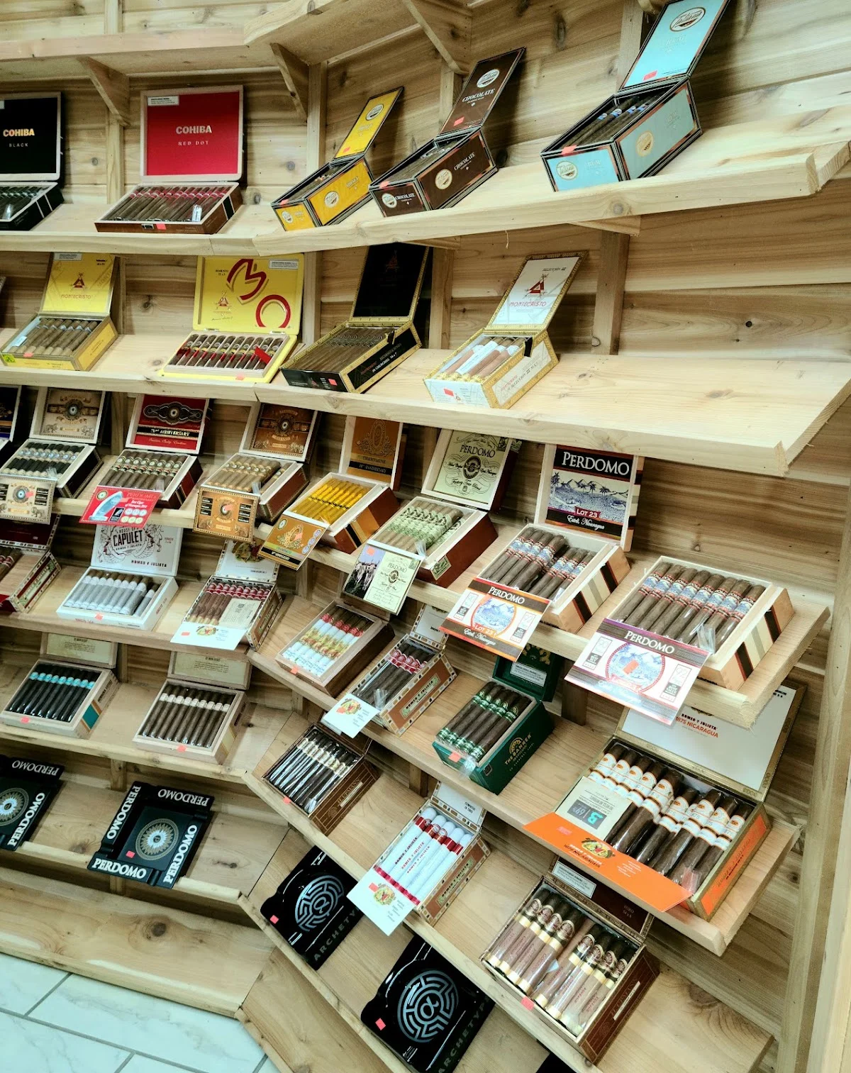 Walk-in cigar humidor shelving at Midwest Smoke Shop on Audrey Street