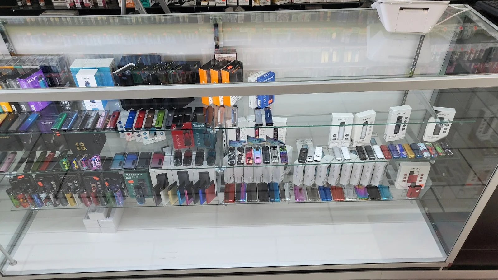 CBD and kratom product shelf at Midwest Smoke Shop on Audrey Street