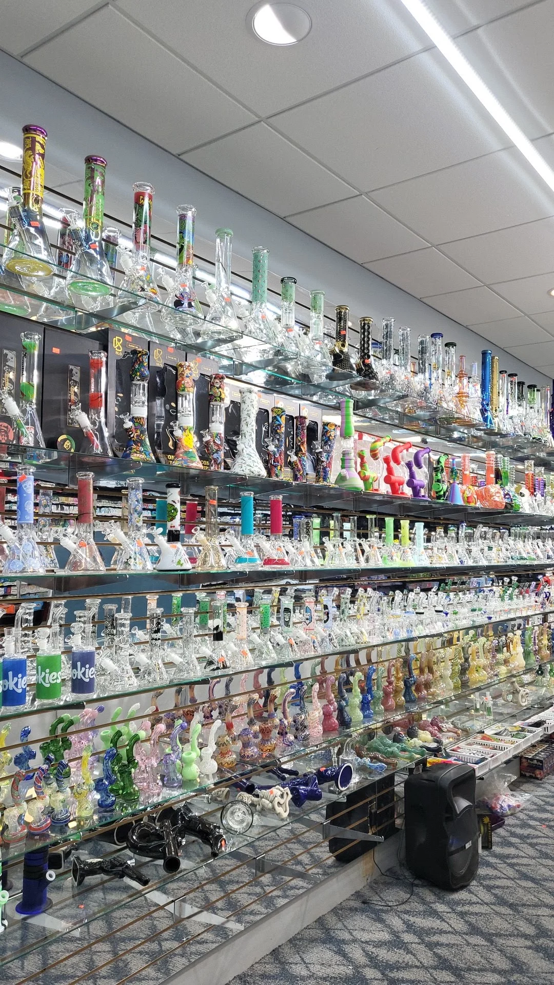 Glass pipes and hookah display wall at Midwest Smoke Shop on Audrey Street
